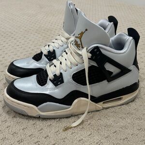 Air Jordan Retro 4 Sneakers in Black, Gray and White. Youth 6.5